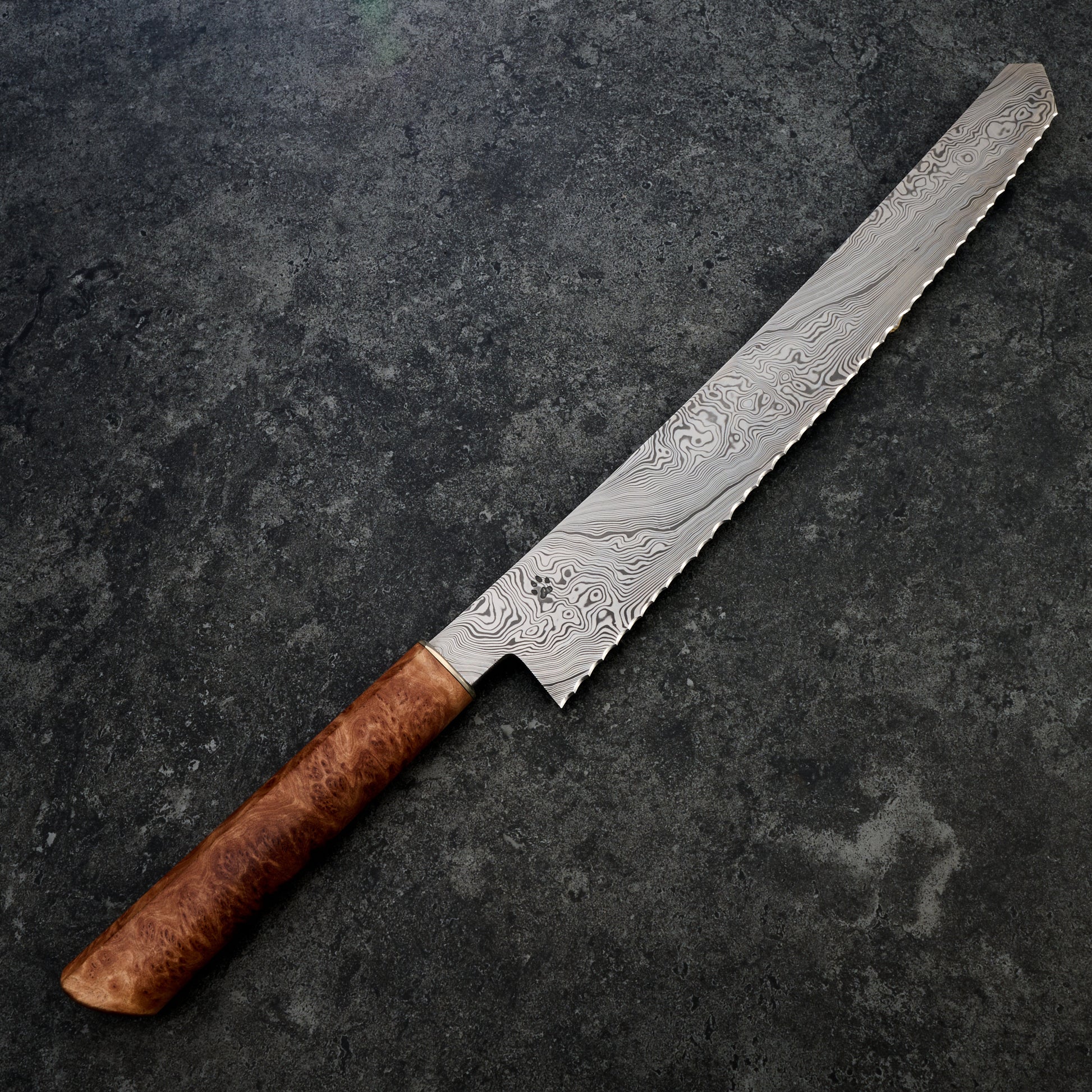 Bread Knife 280mm Damasteel DenseTwist, Eucalyptus Burl & Brass