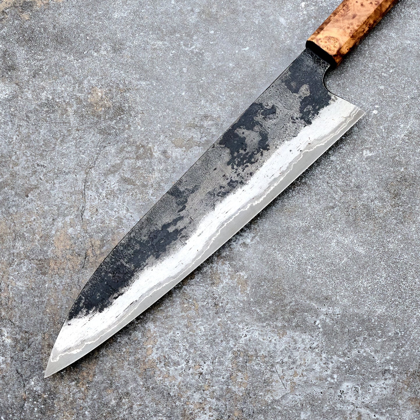 Gyuto 240mm GoMai Wrought Iron, Nickel, 52100, Black Ash Burl – blade close-up