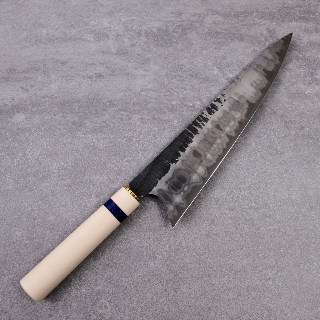 https://moderncooking.com/cdn/shop/files/Gyuto240mmSGrind1.2519StainlessCladSanMai_1024x1024.jpg?v=1700663148