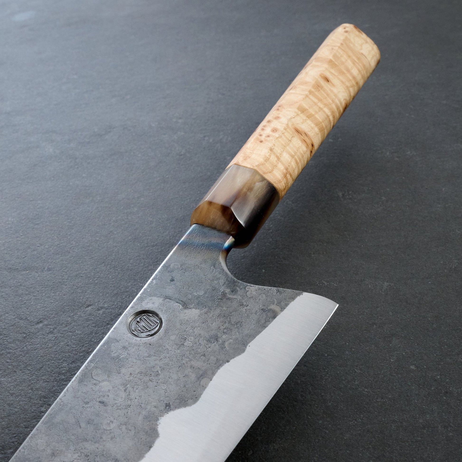 Gyuto 255mm Plain Forged KU Ash Masur Heirloom – blade close-up