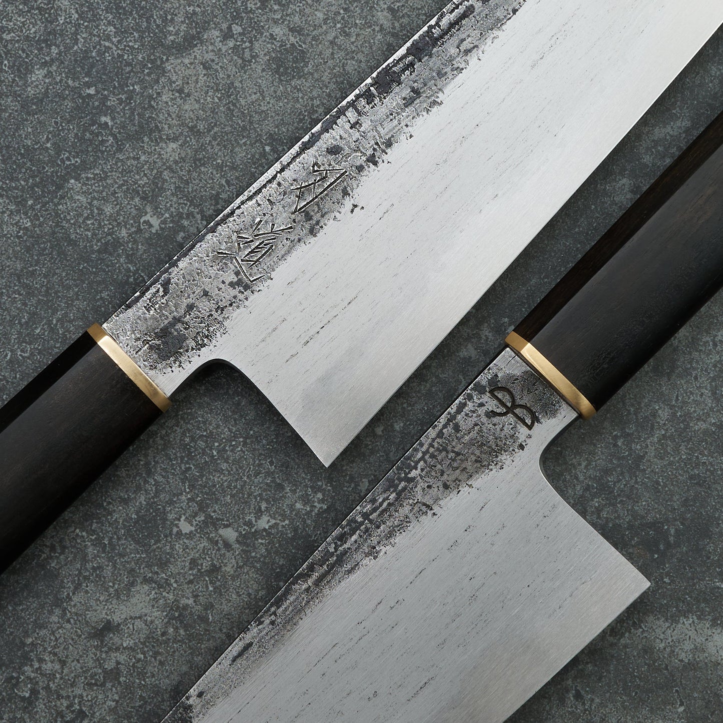 Black X Hado Gyuto 240mm SanMai, 135Cr3, Wrought Iron, Ebony and Brass – detail view