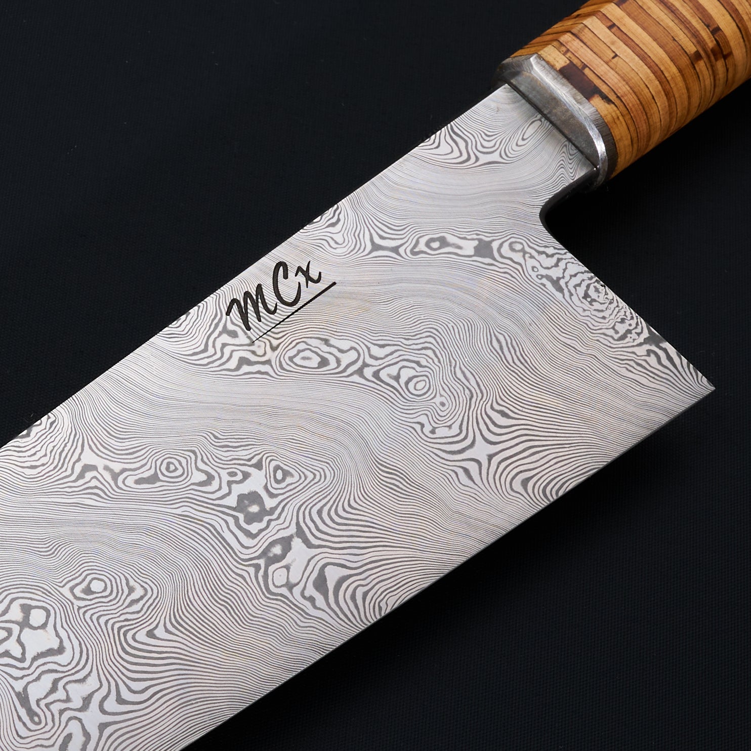 Björkmans Twist blade detail with MCx mark and stainless-steel bolster
