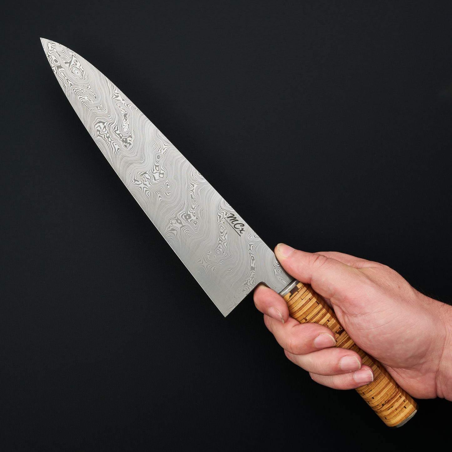MCx Johnsson × Krichbaum gyuto held in hand, showing its complete blade profile
