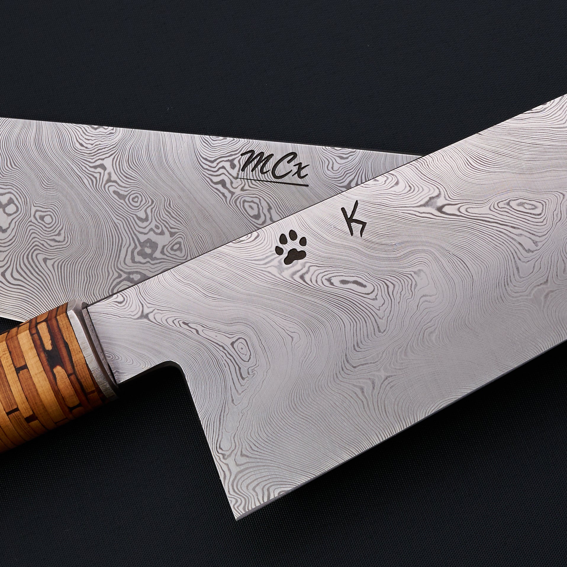 Johnsson × Krichbaum maker marks shown across two Björkmans Twist blades