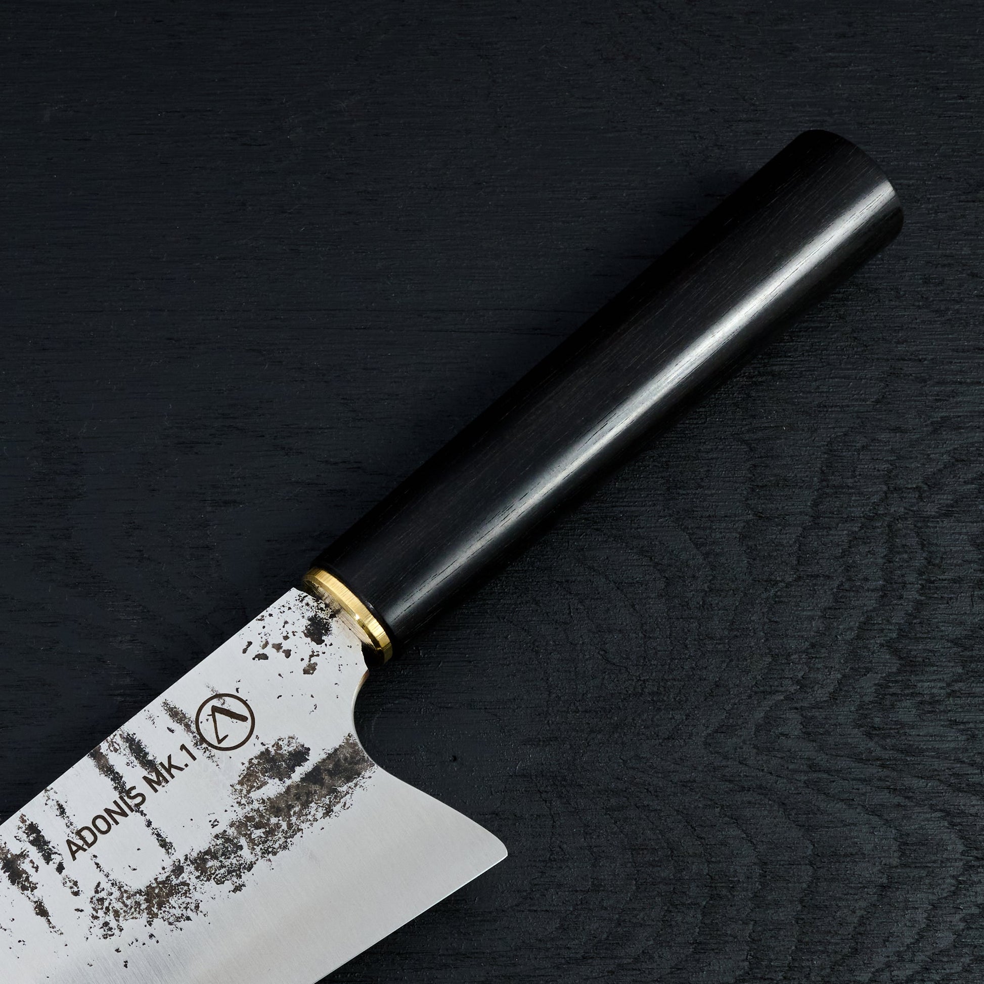 Adonis Mk.1 Gyuto 230mm 1.2442 Mono Laos Ebony handle – detail view